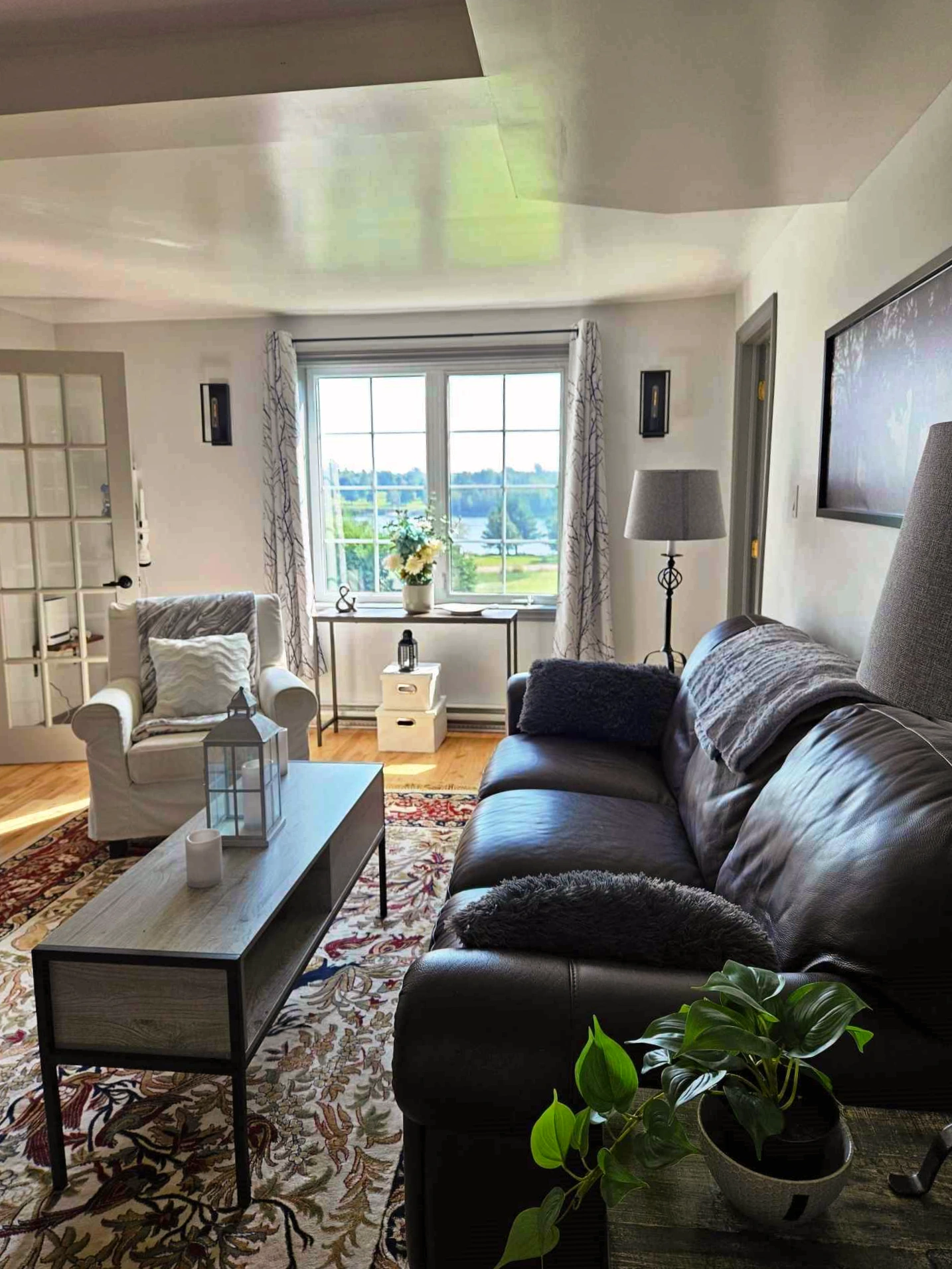 Farmhouse TV room with window view